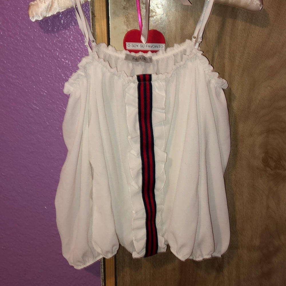 White blouse off the shoulder
